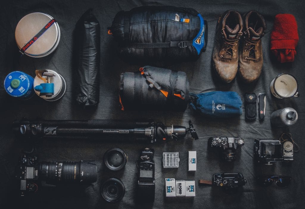Hiking boots and outdoor clothing for camping
